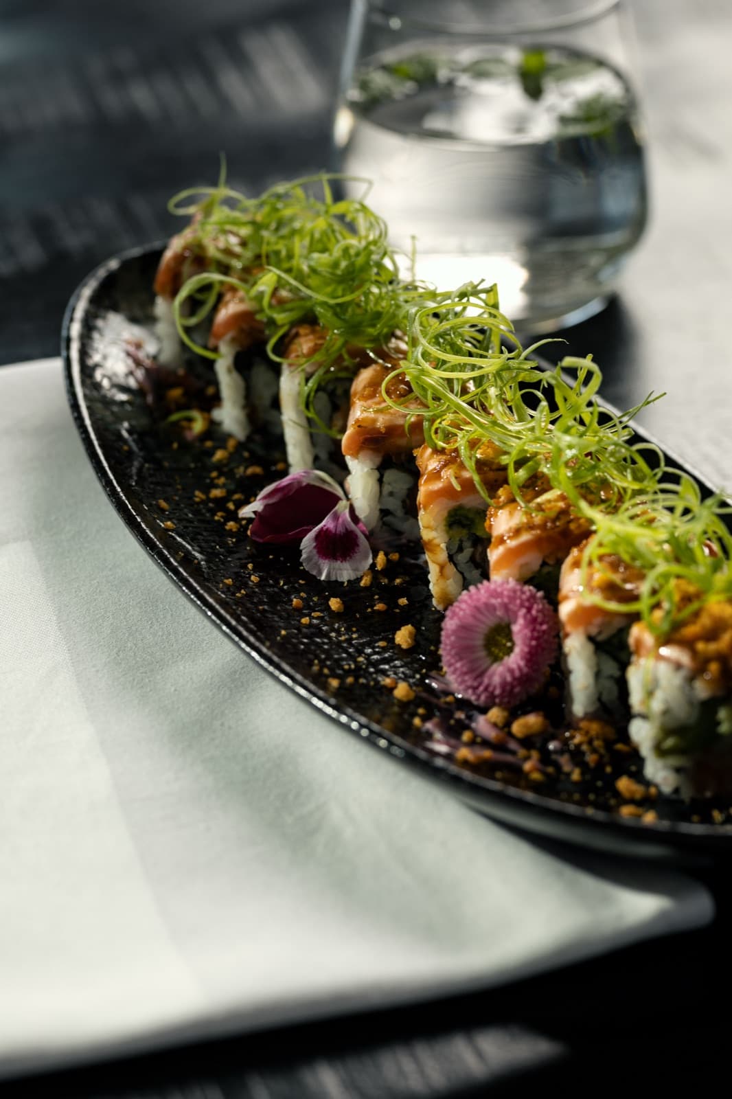 Salmon roll with seared salmon and spring onion