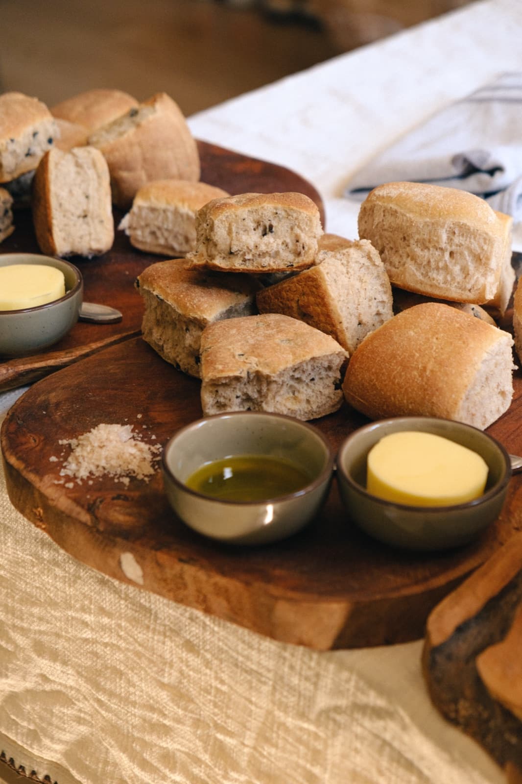 Fresh bread with butter, olive oil and sea salt