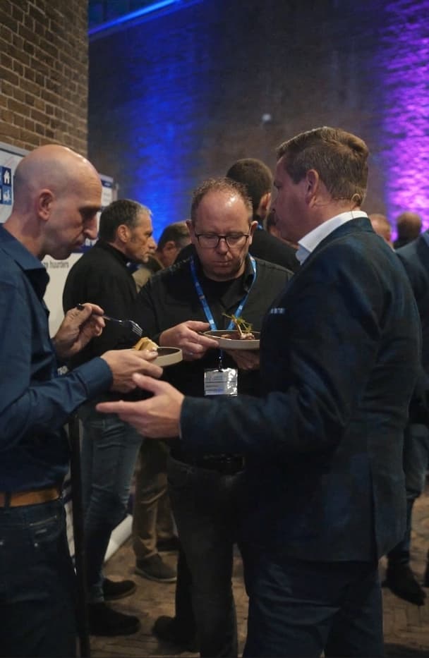 Guests tasting a course at an event on location